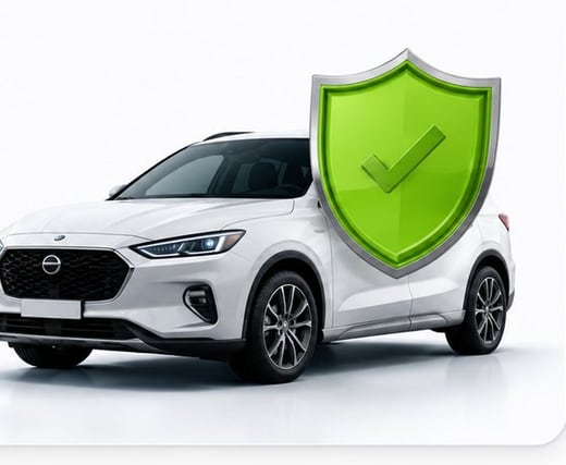 White car beside a green protection shield